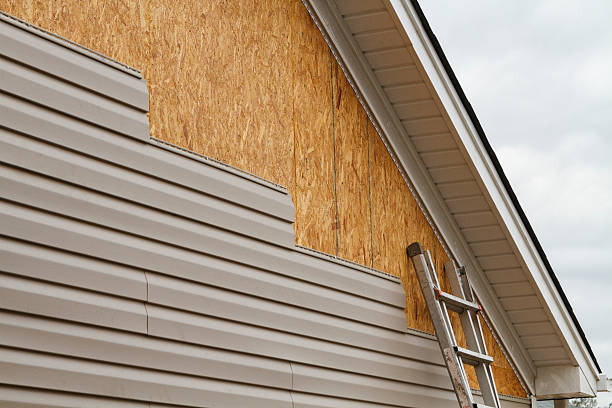 Professional Siding Replacement technician working in Warnock, OH